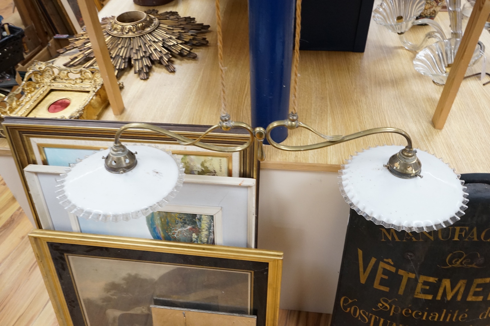 A 19th century brass two branch adjustable ceiling light, with with white glass shades, 82cm full width shade to shade